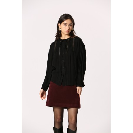 Blouse à galons ajourés